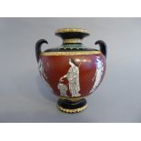 A "Flaxmans Athena" Grecian style decorated vase, classical figures with "Greek key" frieze.