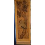 A Japanese C19th Meiji period scroll depicting central crane on fir tree with calligraphic cypher