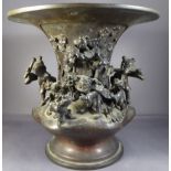 A Chinese early C20th bronze vessel with flared rim above elaborately designed traditional New