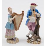 A Meissen figure of a musician and one similar: the first in the form of a youth pipe player from