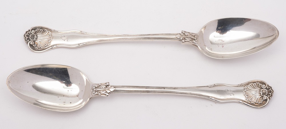 A pair of Victorian silver fiddle, shell and thread pattern serving spoons, maker George Adams,