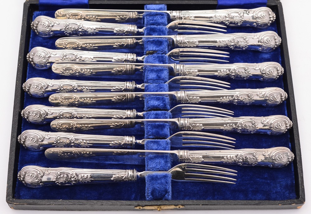 A set of six Victorian silver Kings pattern cake knives and forks, maker George Adams, London,