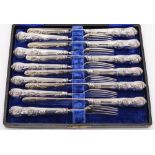 A set of six Victorian silver Kings pattern cake knives and forks, maker George Adams, London,