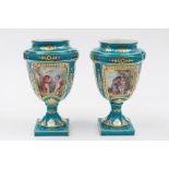 A pair of French porcelain vases in the Sèvres manner: of cartouche foliate moulded profile  set on