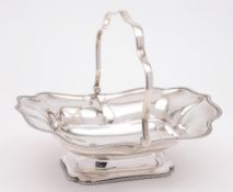 An Edward VII silver swing-handled fruit basket, maker Atkin Brothers, Sheffield,
