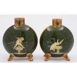 A pair of Moore Brothers pate sur pate moon flasks: each of flattened circular form with short