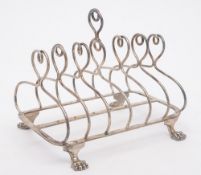 A George III Scottish silver six division toast rack, maker Mitchell and Russel, Edinburgh, 1814:,