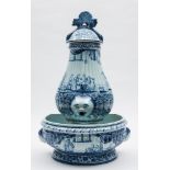 A Dutch delft wall mounted cistern,