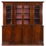 A Victorian mahogany library bookcase:, of breakfront outline,