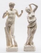 A pair of large Nove creamware figures: , he modelled standing before a stump wearing a fig leaf,