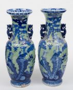 A large pair of Staffordshire ironstone vases: in the Chinese manner and of baluster form with