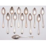 A set of twelve George III Scottish silver pointed Old English pattern dessert spoons,