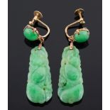 A pair of jade pendant earrings:,