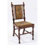 A child's Victorian yew-wood chair:,