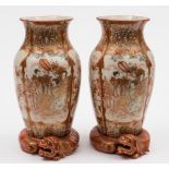 A pair of unusual Japanese Kutani vases: of quatrefoil shape with coiled Fo dog bases,