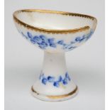 A rare Sèvres porcelain eye bath: painted in blue monochrome with floral garlands by Nicolas