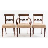 A set of eight late Regency mahogany dining chairs:,