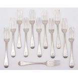 A set of twelve George III Scottish silver Old English pattern dessert forks,