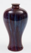 A Chinese flambe-glazed Meiping vase: with short waisted neck,