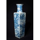 A large Chinese blue and white vase: of flared square section with waisted neck,