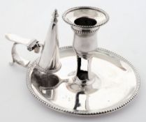 A George III silver chamber stick and snuffer, maker IC possibly John Carter II, London,