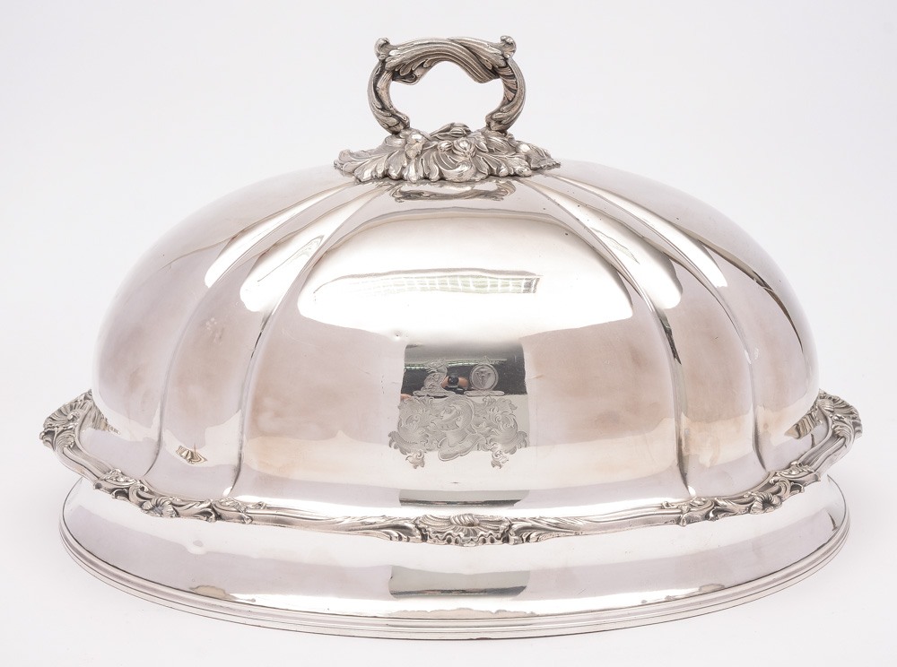 A late Victorian plated meat dish cover: crested, of domed oval outline,