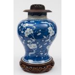 A Chinese blue and white baluster vase: with cylindrical neck and flared foot,