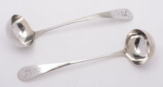 A pair of George III Scottish silver pointed Old English pattern toddy ladles,