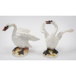 A pair of Meissen figures of swans: modelled after the originals by J.J.