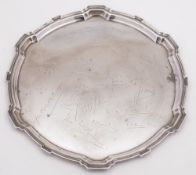A silver presentation salver, maker William Neale Ltd, Birmingham 1936:,