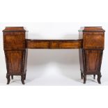 A Regency mahogany twin-pedestal sideboard:, of bowed breakfront outline,