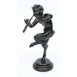 A 19th century bronze figure of a satyr : playing pipes whilst dancing, raised on a socle base,