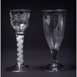 An opaque twist wine glass and an ale glass: the ogee bowl engraved with a bloom,