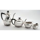 An Edward VII matched silver four-piece tea and coffee service, maker Henry Stratford, London 1901,