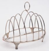 A George III silver toast rack, maker Peter & Ann Bateman, London,