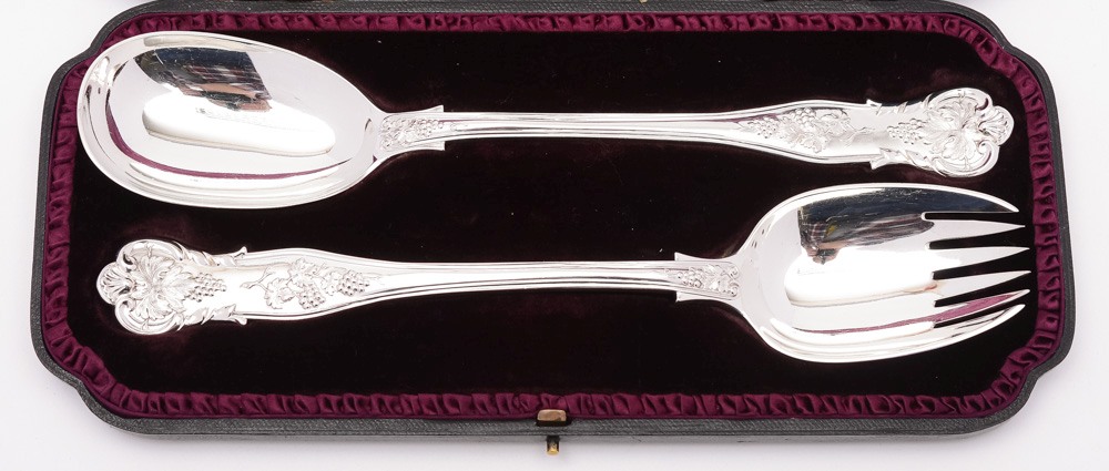 A pair of bright vine pattern silver salad servers, maker John Aldwinckle & Thomas Slater, London,