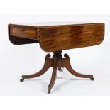 A Regency mahogany drop flap breakfast table:, the hinged top with rounded corners,