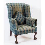 A mahogany wing frame armchair in the Georgian taste:,