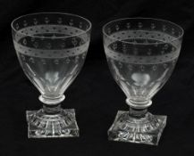 A pair of rummers: the bowls engraved with a simple foliate and zig-zag band above basal slice