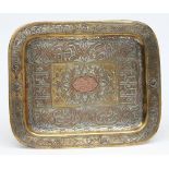 A Indo-Persian brass and silver inlaid tray: of rectangular outline,