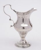 A George III silver cream jug, maker Thomas Liddiard, London, 1785: initialled,