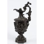 A 19th Century French bronze ewer: of neo-classical form, decorated with putti collecting fish ,