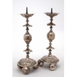 A pair of continental silver miniature pricket candlesticks: with fluted circular drip trays,