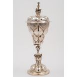 A 19th century German silver goblet and cover: of pineapple design, the lobed,