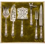 A late 19th/early 20th century French silver and plated six-piece carving/serving set: includes