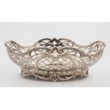 A Dutch silver bread basket: of cartouche-shaped outline, with pierced,