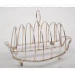 A George III silver six-division toast rack, no maker's mark, London, 1800: of oval outline,