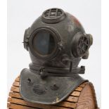 A 3-bolt shallow water diving helmet by Siebe Gorman & Co, London:,