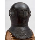 A brass reproduction in the style of Siebe's Open Dress Helmet of 1829:,