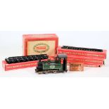 A Mamod 0-4-0 tank live steam tank locomotive: , boxed together with metal track and fuel pellets.